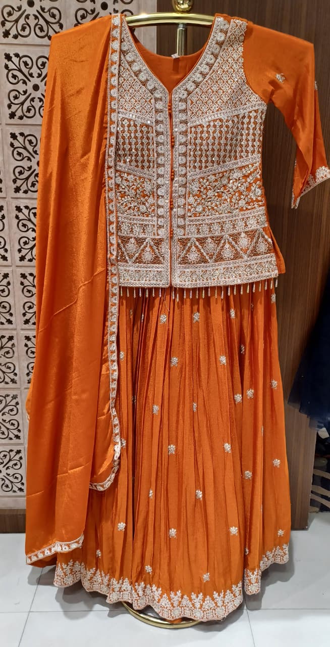 Rust Orange Embroidered Lehenga Set with  Dupatta.