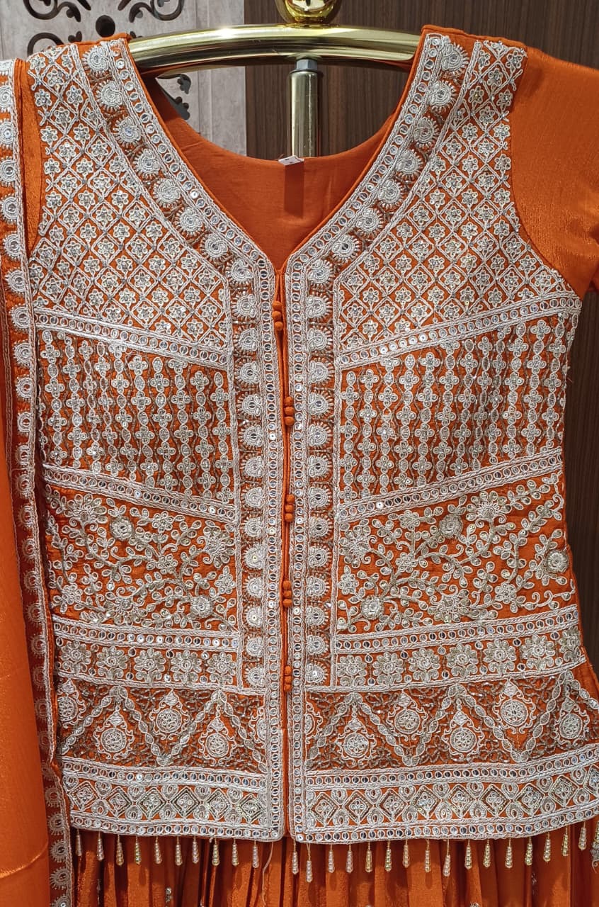 Rust Orange Embroidered Lehenga Set with  Dupatta.