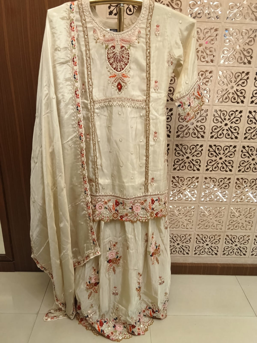 Ivory Embroidered Silk lehenga Suit Set.