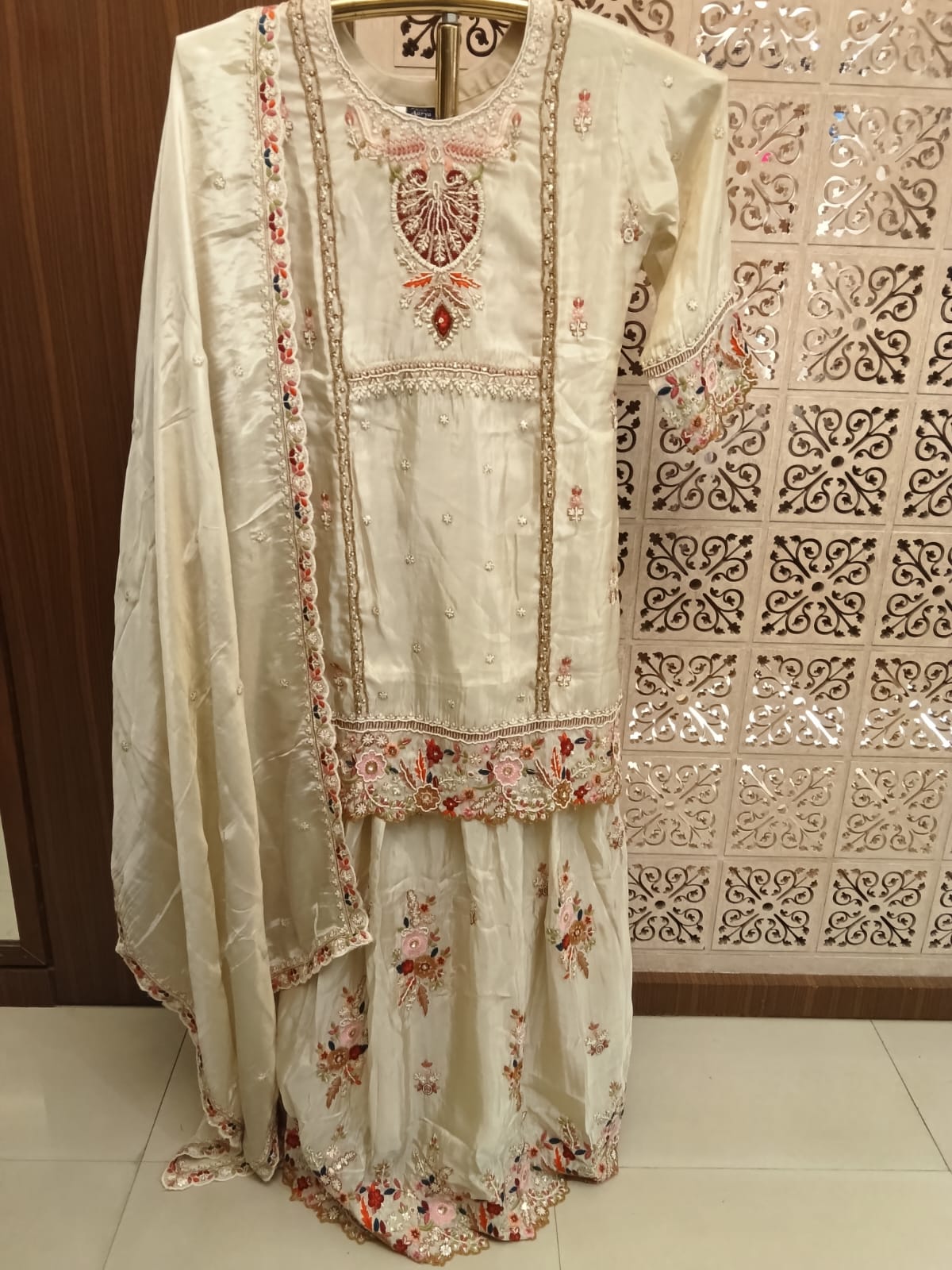 Ivory Embroidered Silk lehenga Suit Set.