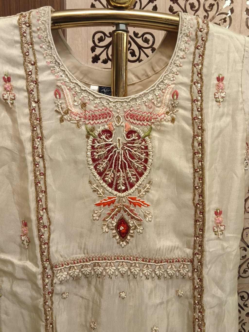 Ivory Embroidered Silk lehenga Suit Set.