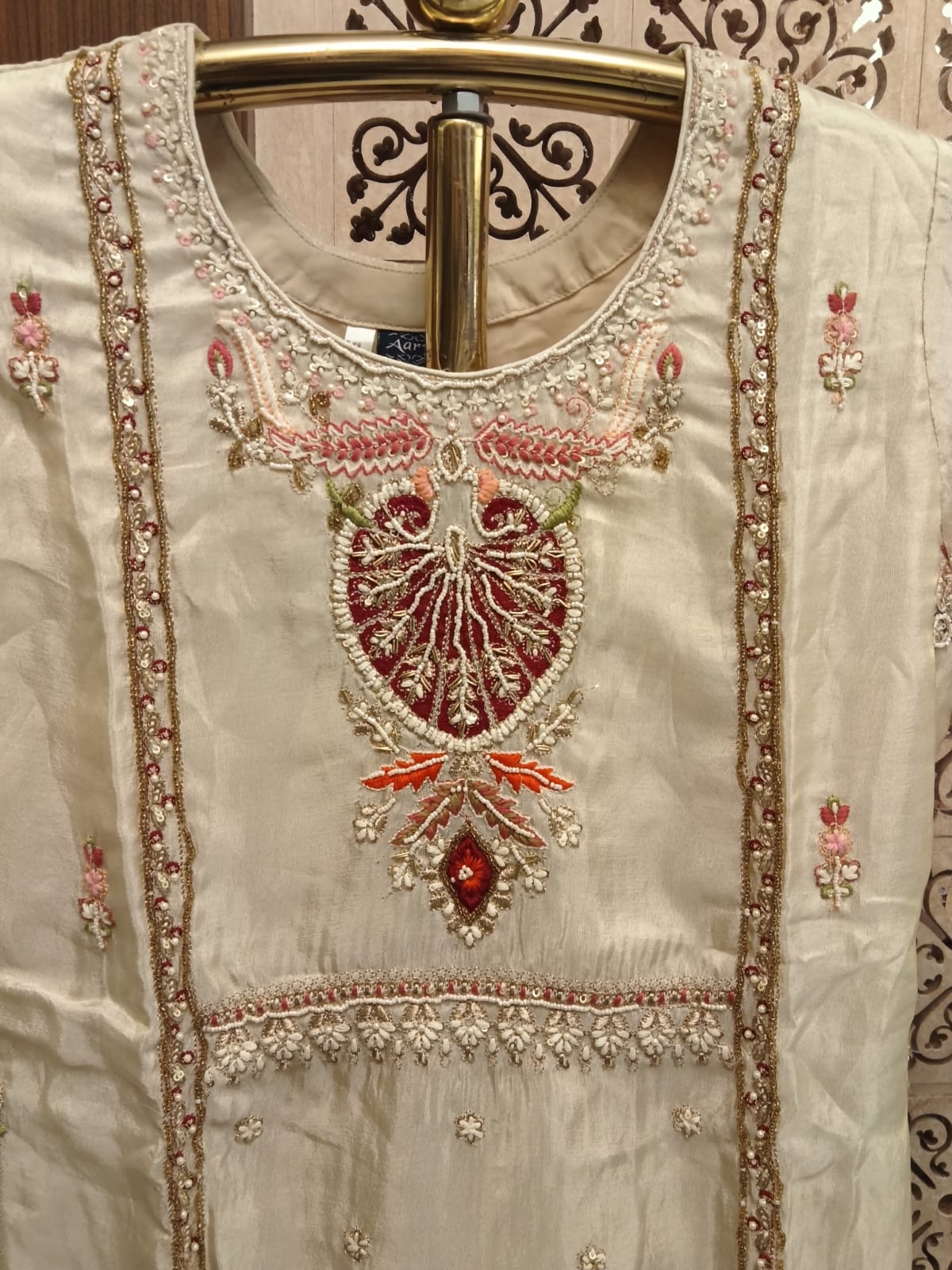 Ivory Embroidered Silk lehenga Suit Set.
