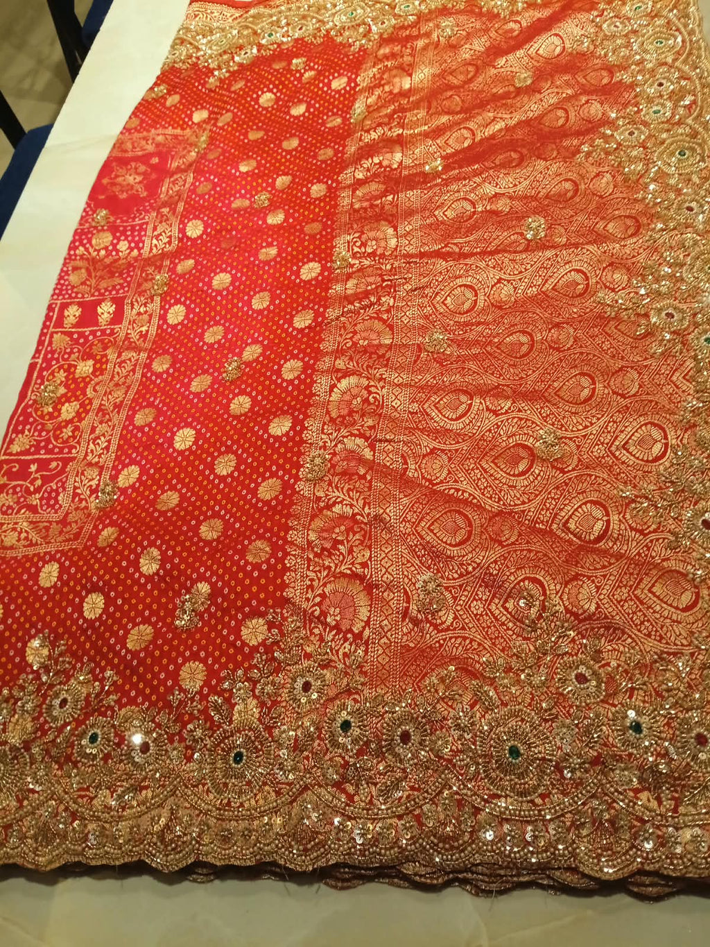 Crimson Elegance Hand-Embroidered Bandhani Saree.