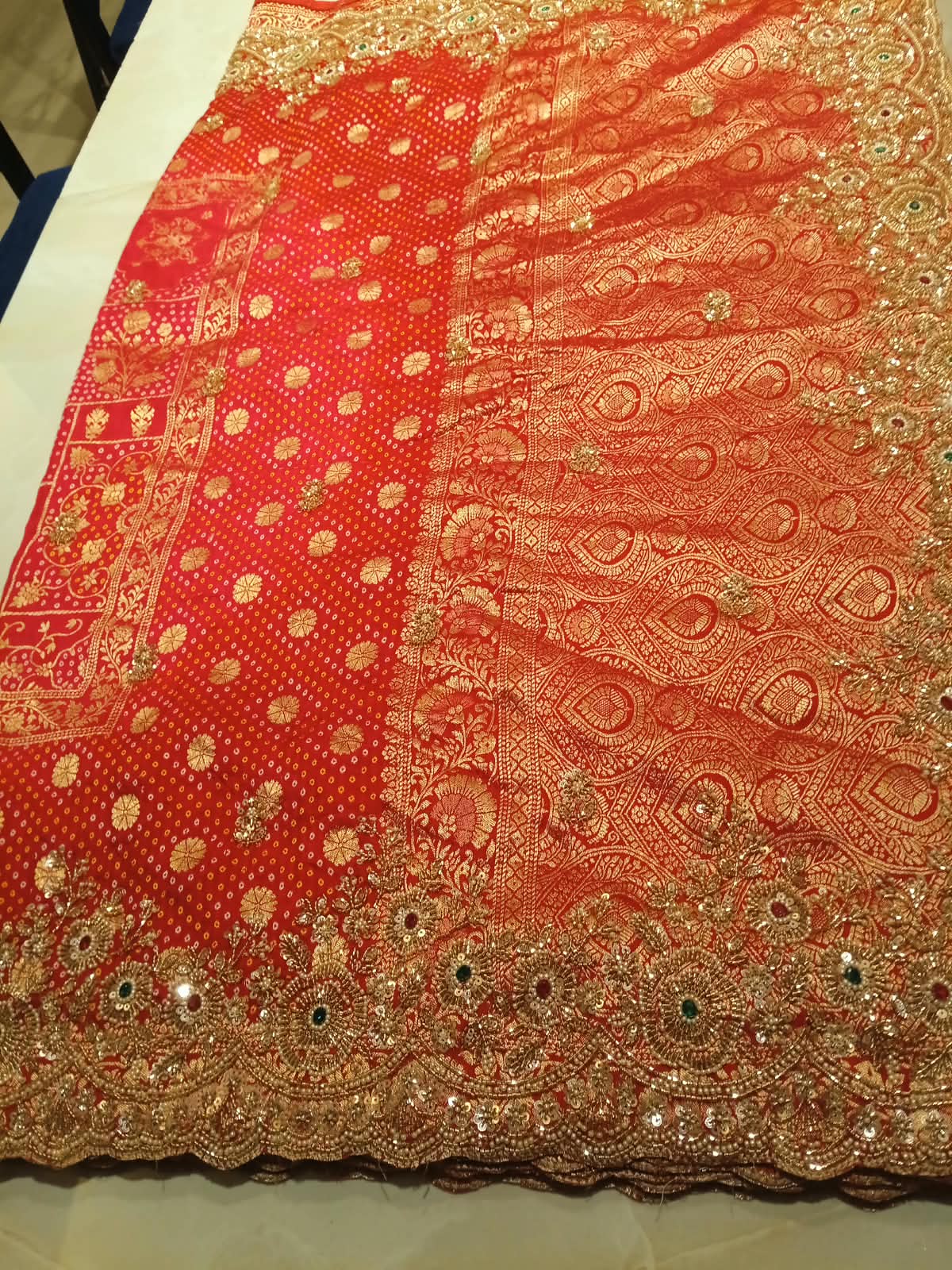 Crimson Elegance Hand-Embroidered Bandhani Saree.