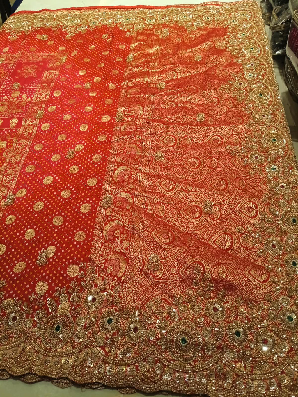 Crimson Elegance Hand-Embroidered Bandhani Saree.