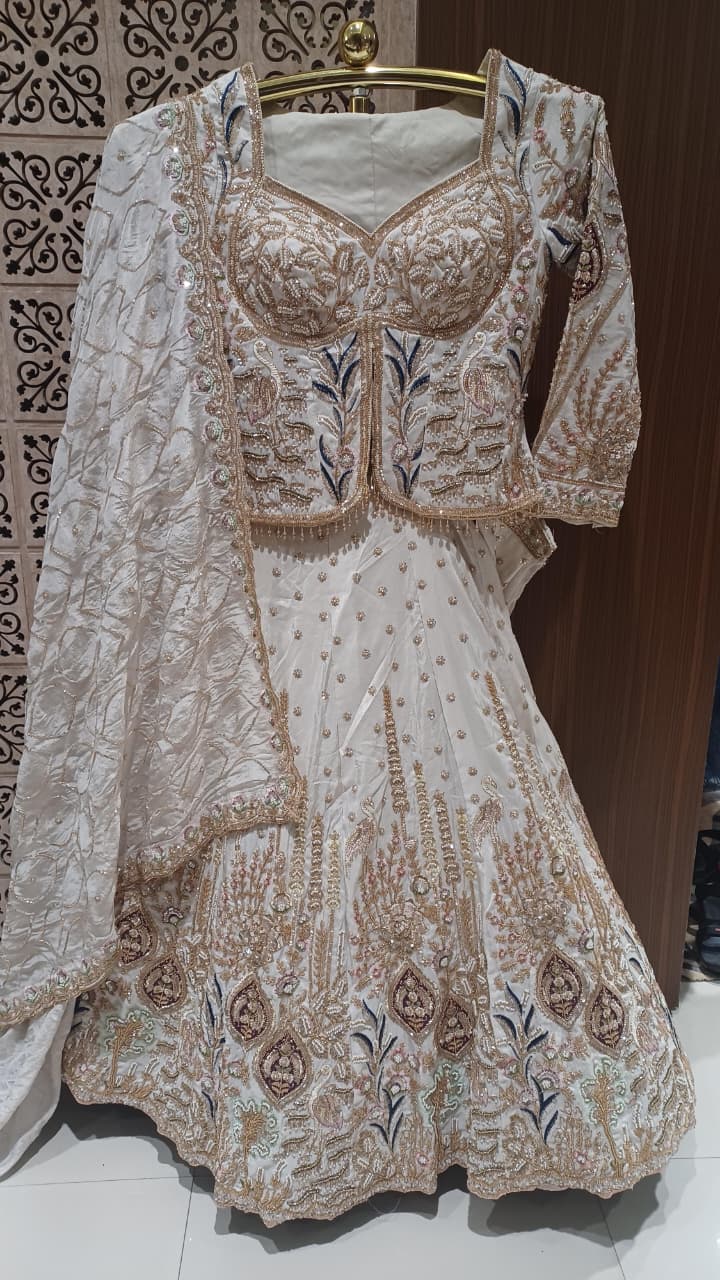 Celestial Ivory Embroidered Lehenga Set.