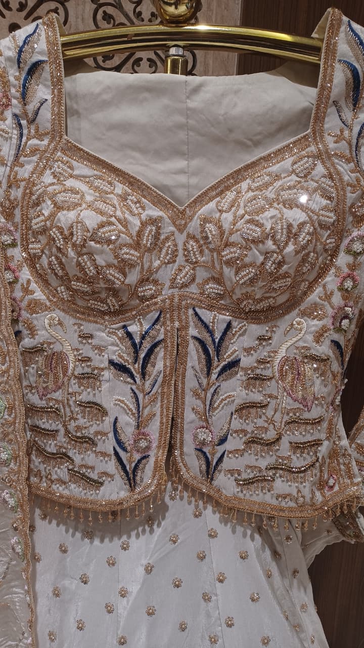 Celestial Ivory Embroidered Lehenga Set.