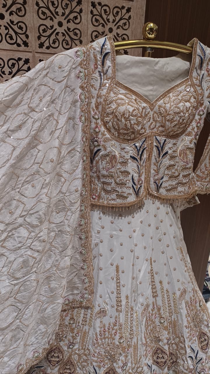 Celestial Ivory Embroidered Lehenga Set.
