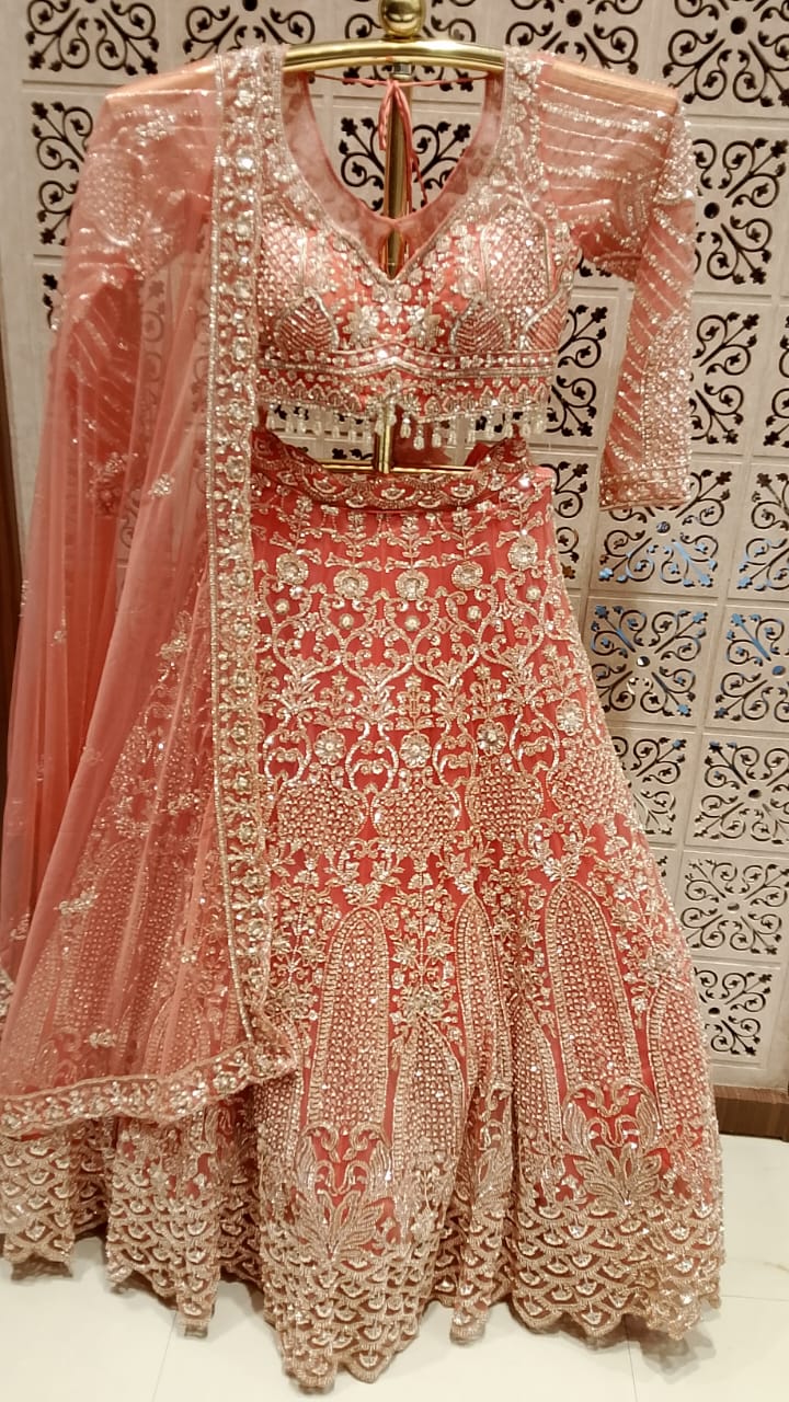 Ethereal Peach-Coral Heavily Embellished Bridal Lehenga