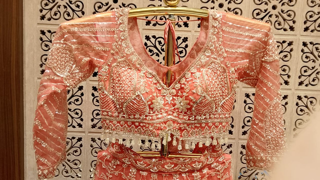 Ethereal Peach-Coral Heavily Embellished Bridal Lehenga
