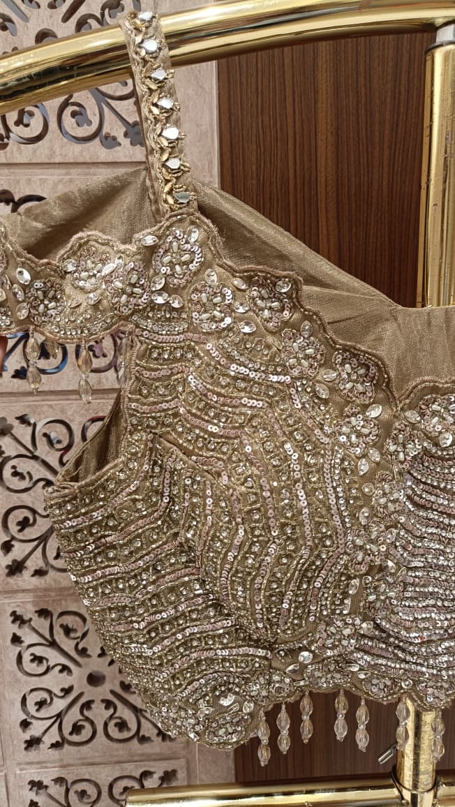 Metallic Champagne Organza Saree with Cold-Shoulder Embellished Blouse