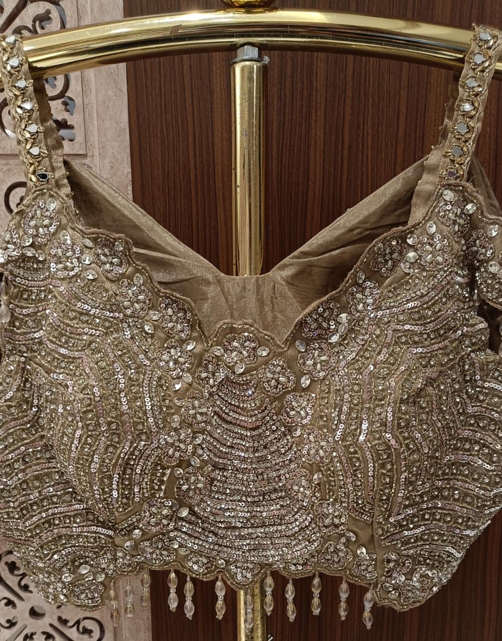 Metallic Champagne Organza Saree with Cold-Shoulder Embellished Blouse