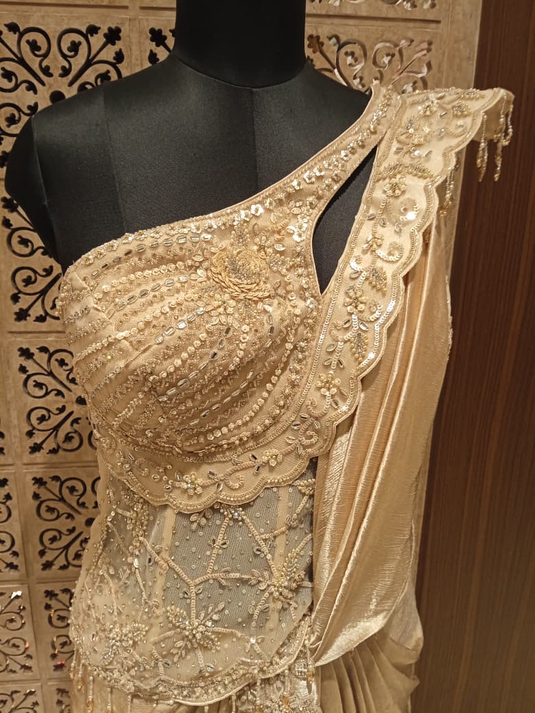 Champagne Gold Shimmer Draped Saree with Asymmetric Sheer Corset Bustier
