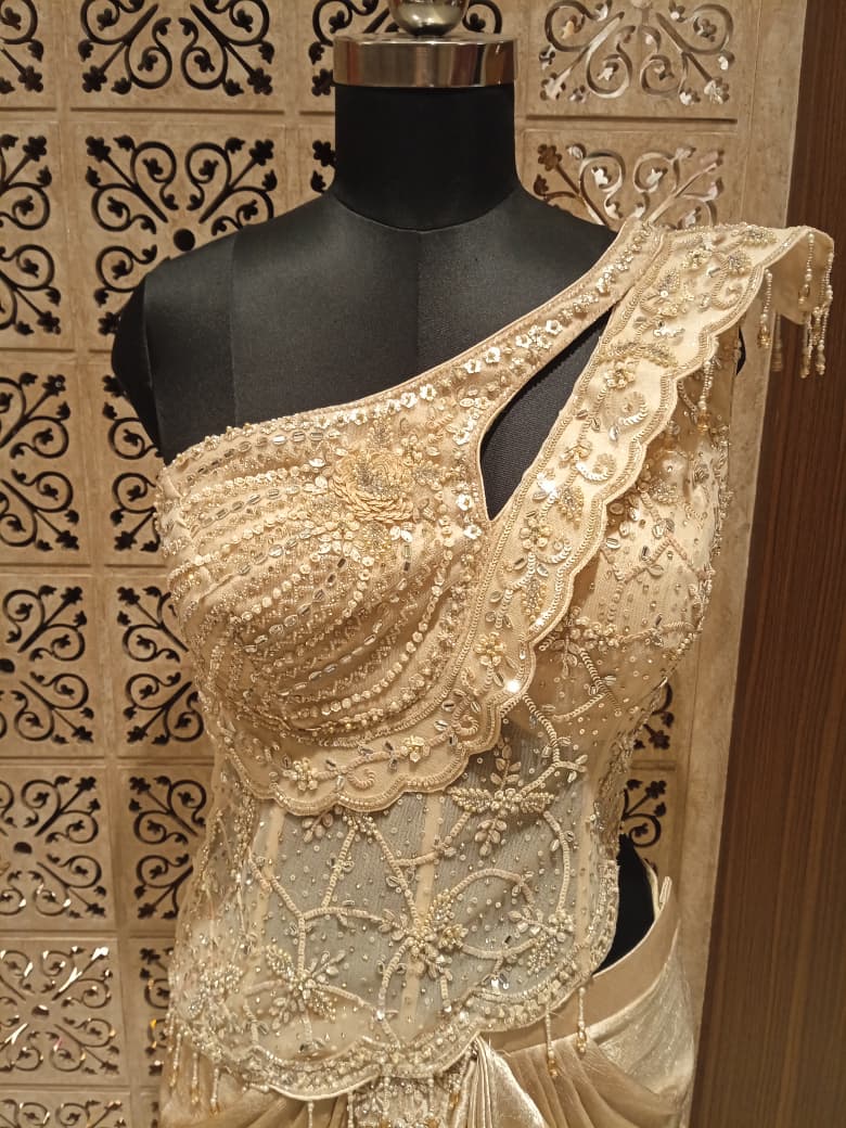 Champagne Gold Shimmer Draped Saree with Asymmetric Sheer Corset Bustier