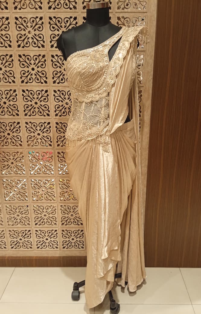 Champagne Gold Shimmer Draped Saree with Asymmetric Sheer Corset Bustier
