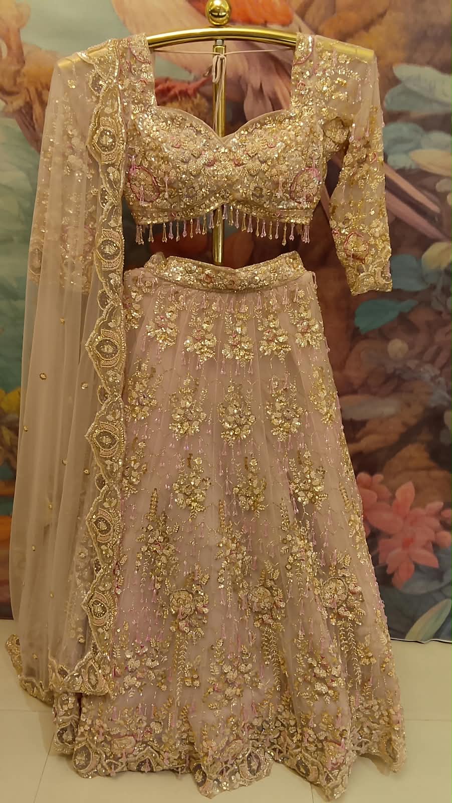 Rose Gold Heavily Embroidered Net Lehenga Choli Set