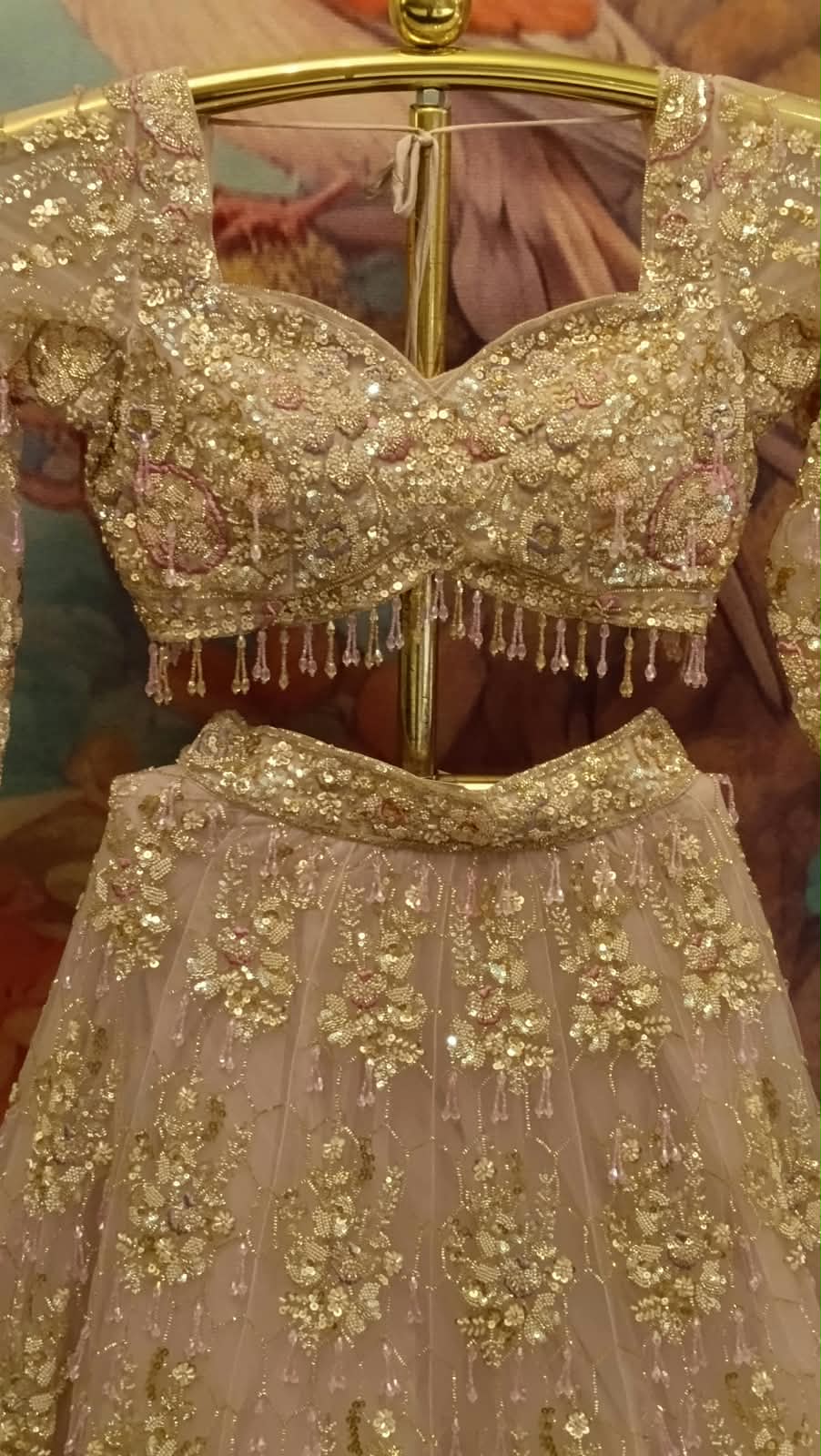 Rose Gold Heavily Embroidered Net Lehenga Choli Set