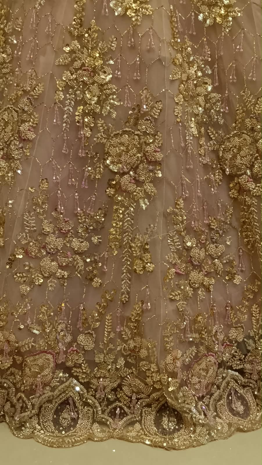 Rose Gold Heavily Embroidered Net Lehenga Choli Set