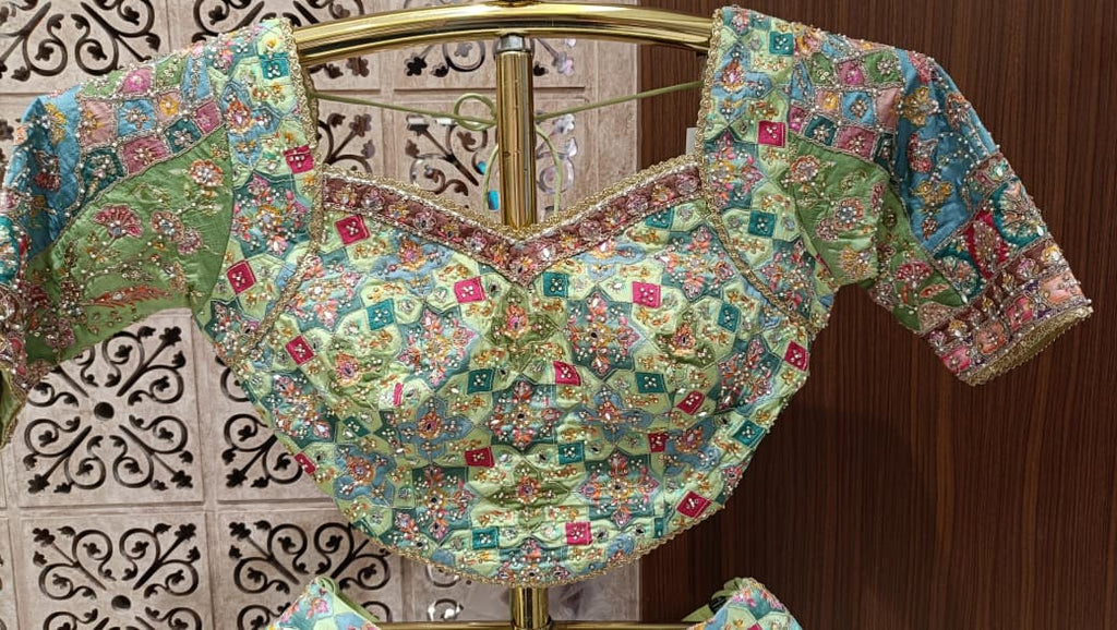 Multi-Color Pastel Embroidered Lehenga Choli Set.