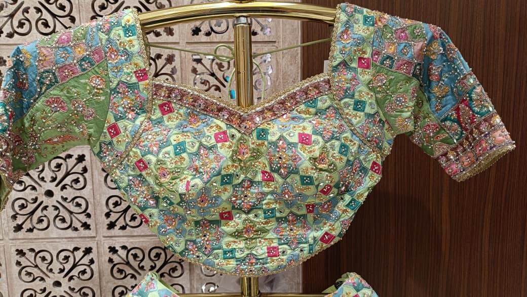 Multi-Color Pastel Embroidered Lehenga Choli Set.
