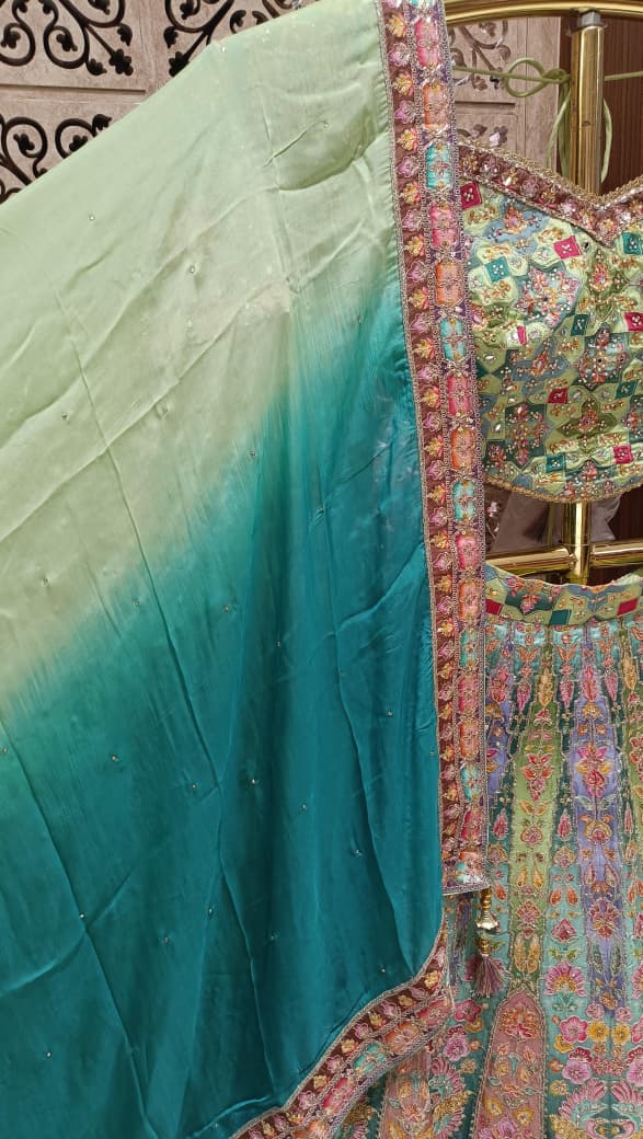 Multi-Color Pastel Embroidered Lehenga Choli Set.