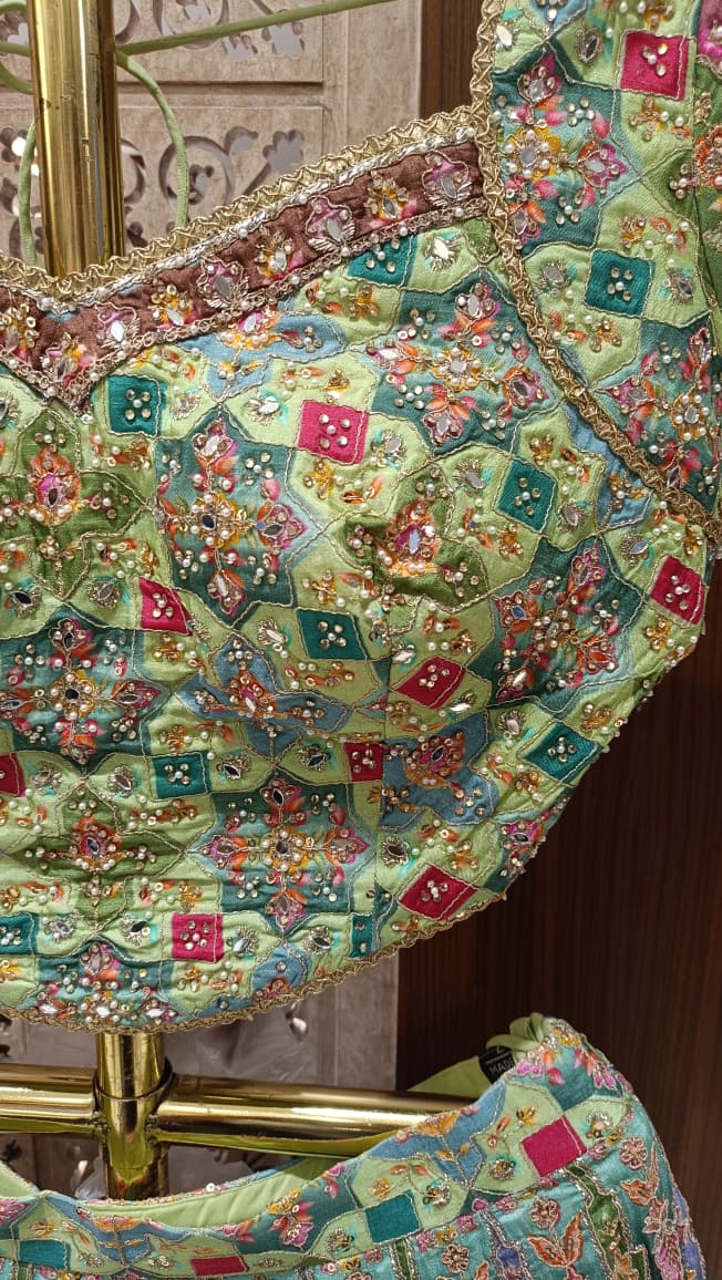 Multi-Color Pastel Embroidered Lehenga Choli Set.