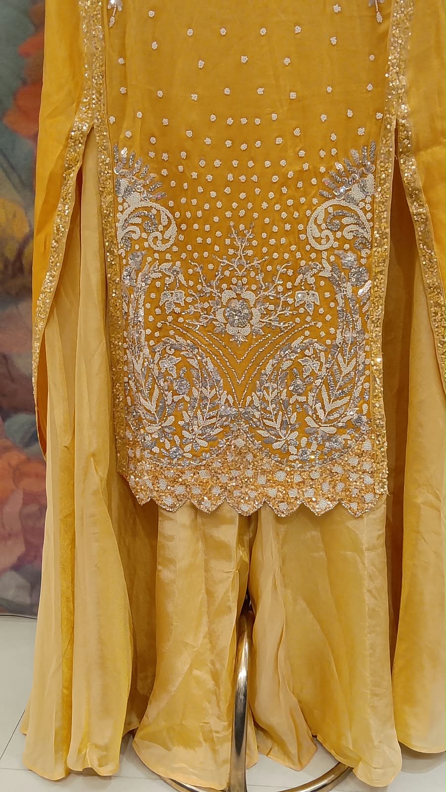 Radiate timeless luxury in our vibrant Sun Flower Yellow Heavily Hand Work Gharara Set.