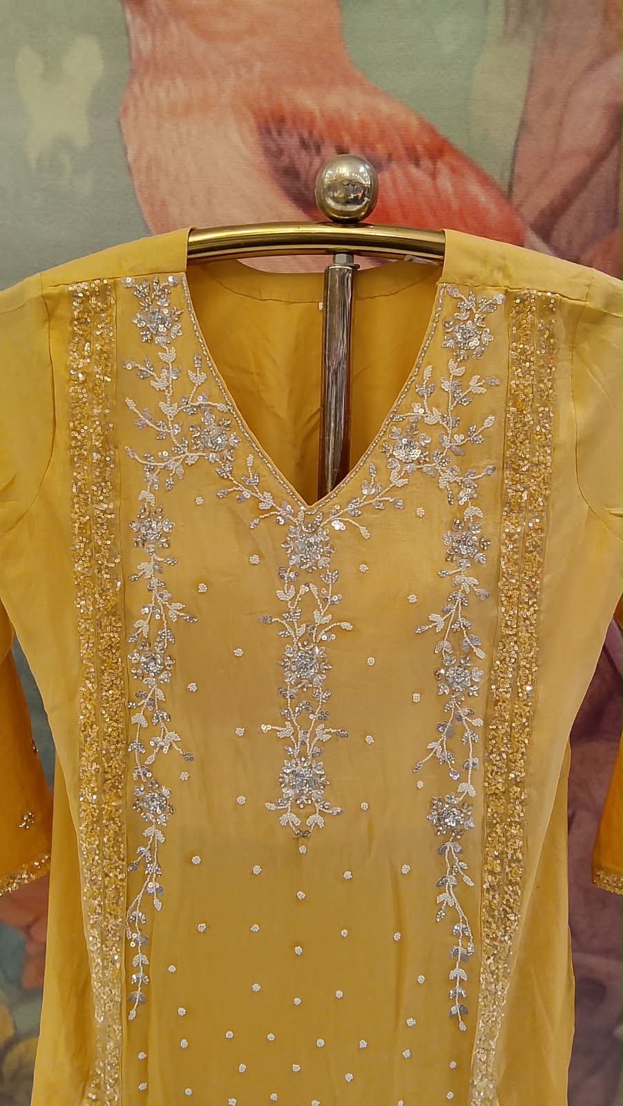 Radiate timeless luxury in our vibrant Sun Flower Yellow Heavily Hand Work Gharara Set.