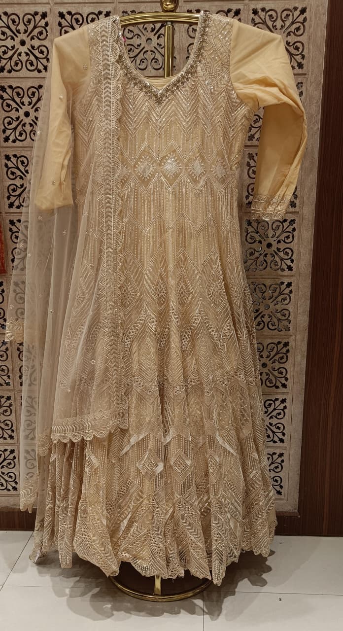 Regal Beige-Gold Sequinned Net Anarkali Gown Set.