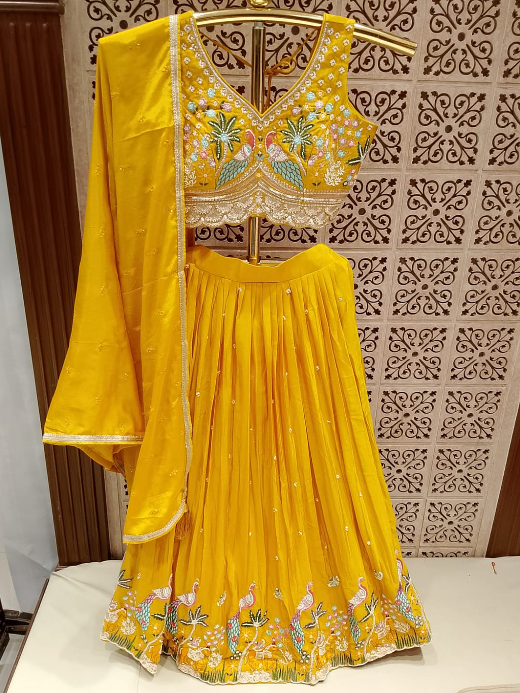 Mayuri Mustard Yellow Embroidered Silk Lehenga Choli Set.