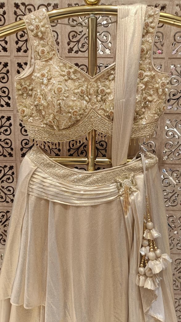 Champagne Gold Draped Satin Silk Hand Work Lehenga Choli Set.