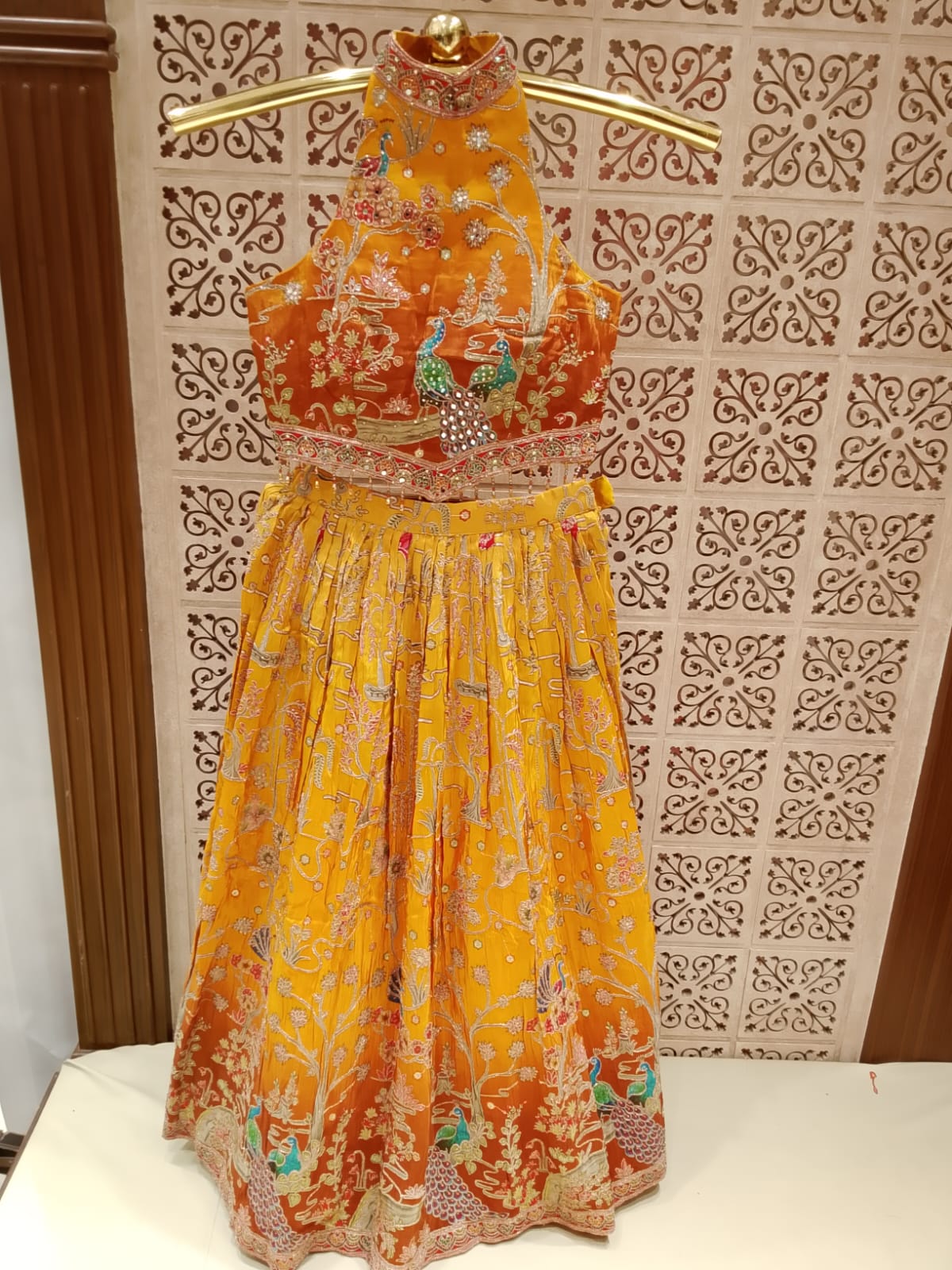 Mustard Yellow & Ochre Satin Silk Lehenga Set with Peacock Pichwai Embroidery.