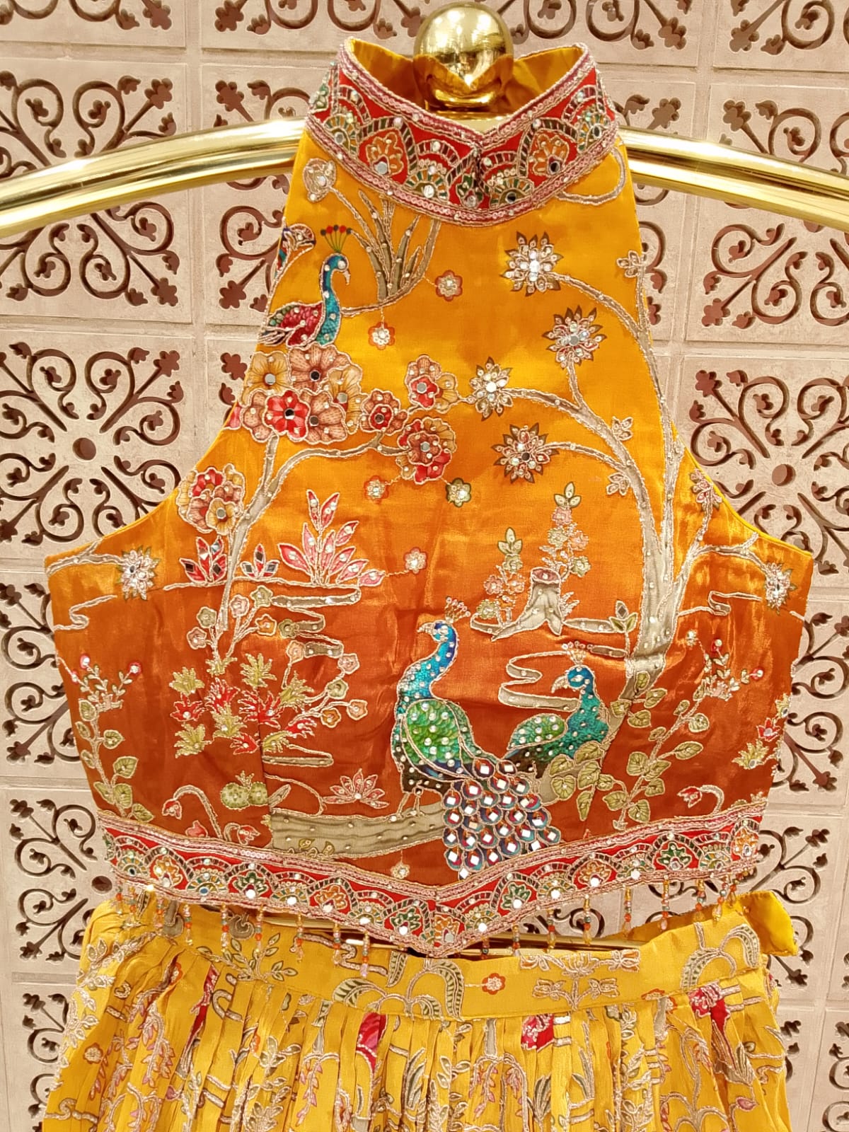 Mustard Yellow & Ochre Satin Silk Lehenga Set with Peacock Pichwai Embroidery.