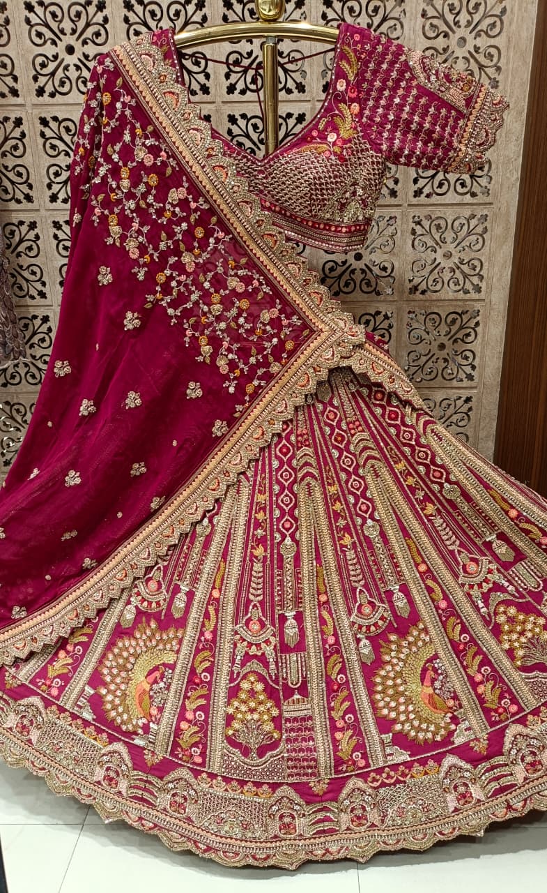 Rani Pink Royal Raw Silk Bridal Lehenga with Peacock and Kalash Zardosi Embroidery.